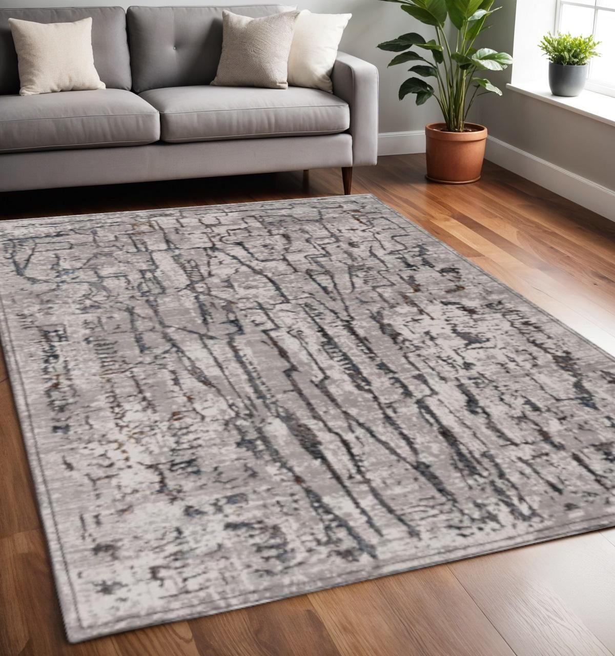 Gray and Black Abstract Distressed Polyester Area Rug, 5′ × 8′