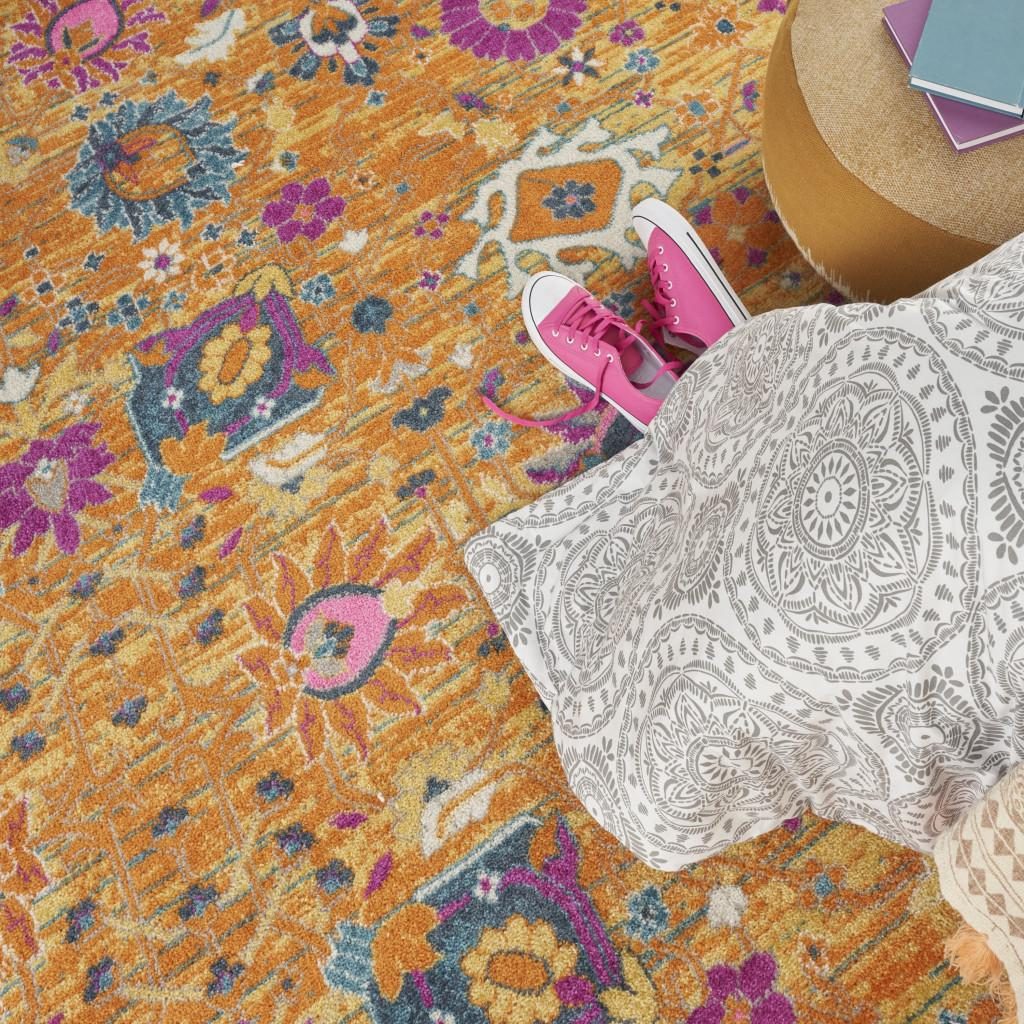 Blue and Orange Floral Distressed Polypropylene Rectangle Area Rug