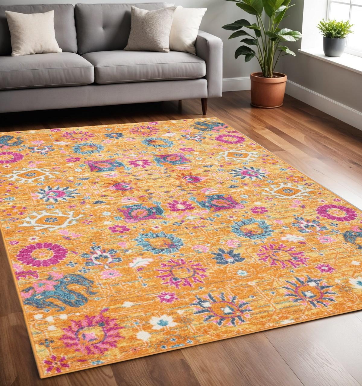 Blue and Orange Floral Distressed Polypropylene Rectangle Area Rug, 5′ × 7′