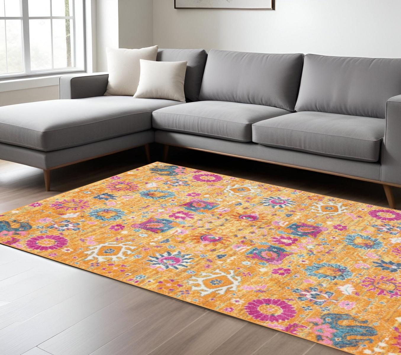 Blue and Orange Floral Distressed Polypropylene Rectangle Area Rug, 7′ × 10′