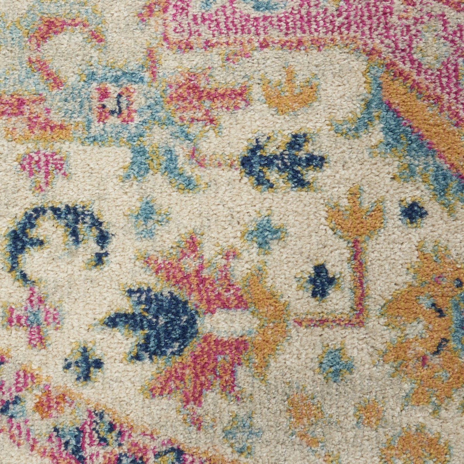Pink and Ivory Southwestern Distressed Polypropylene Area Rug
