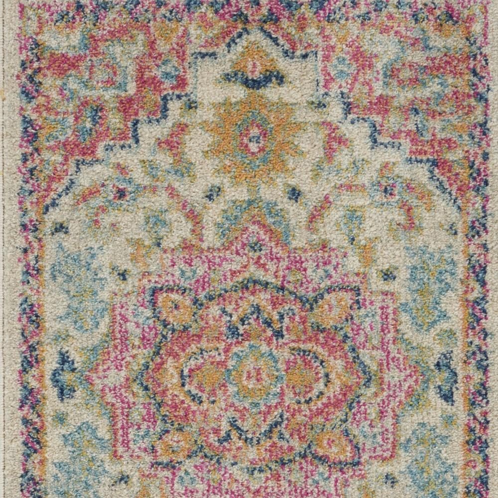 Pink and Ivory Southwestern Distressed Polypropylene Area Rug