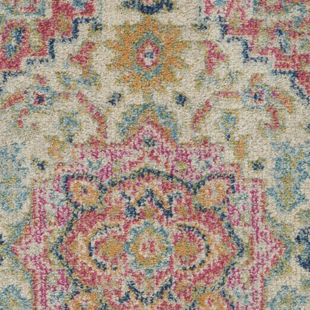 Pink and Ivory Southwestern Distressed Polypropylene Area Rug