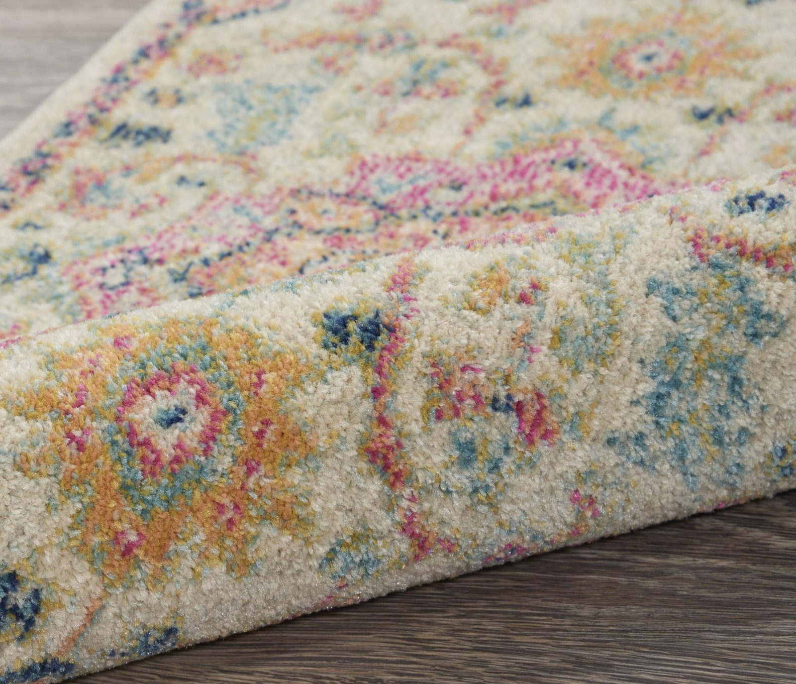Pink and Ivory Southwestern Distressed Polypropylene Area Rug