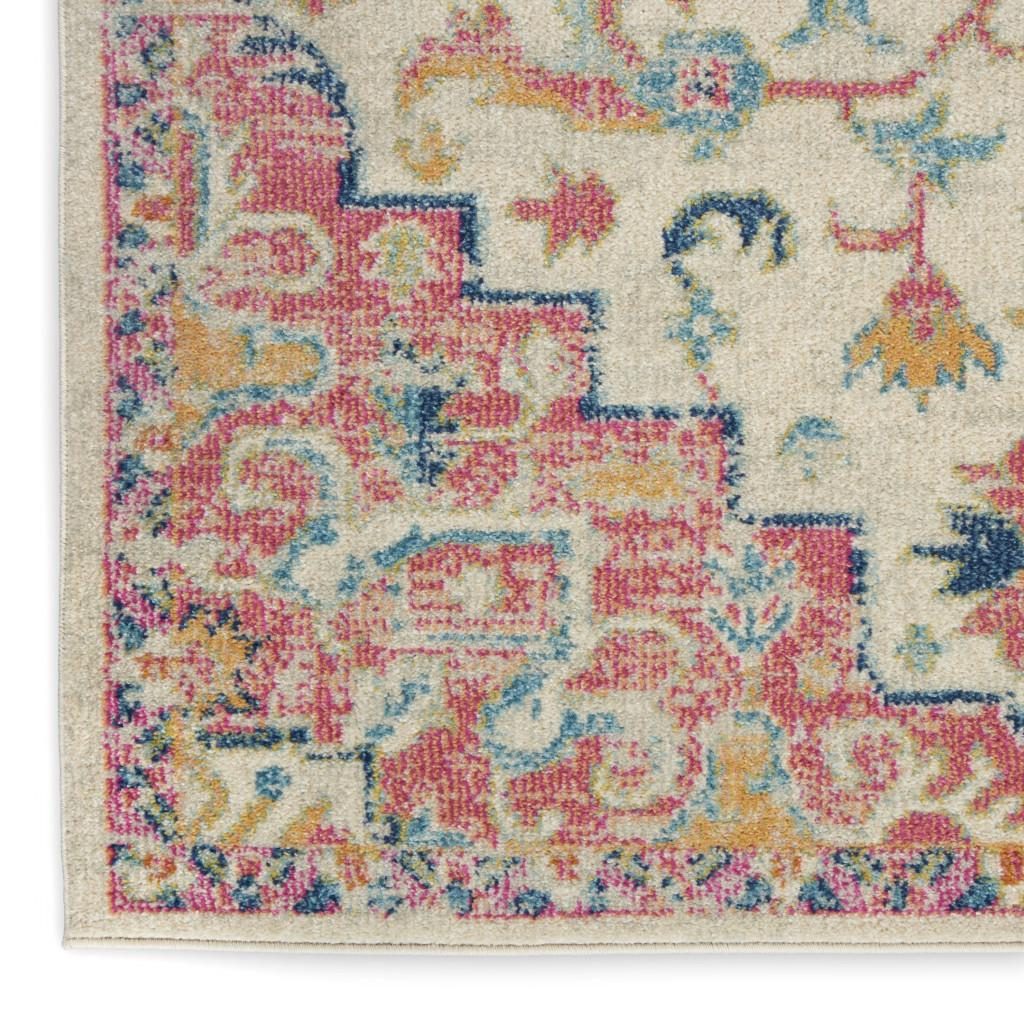 Pink and Ivory Southwestern Distressed Polypropylene Area Rug