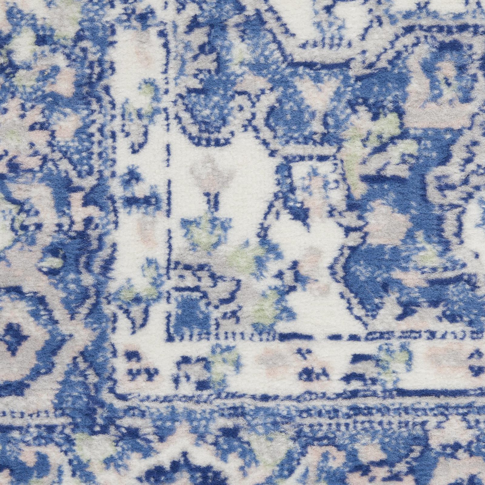 6′ X 9′ Blue and Gray Floral Polypropylene Area Rug