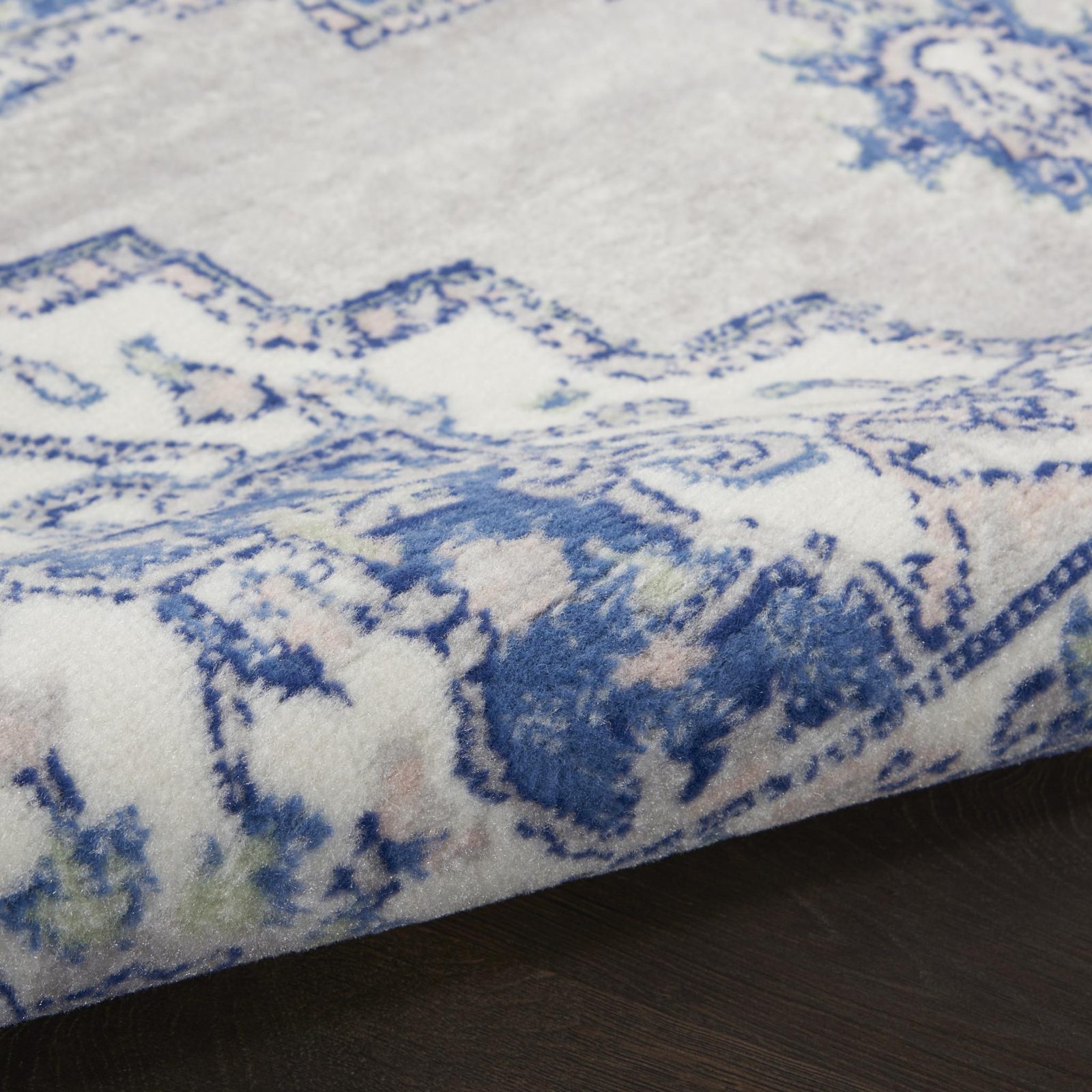 6′ X 9′ Blue and Gray Floral Polypropylene Area Rug