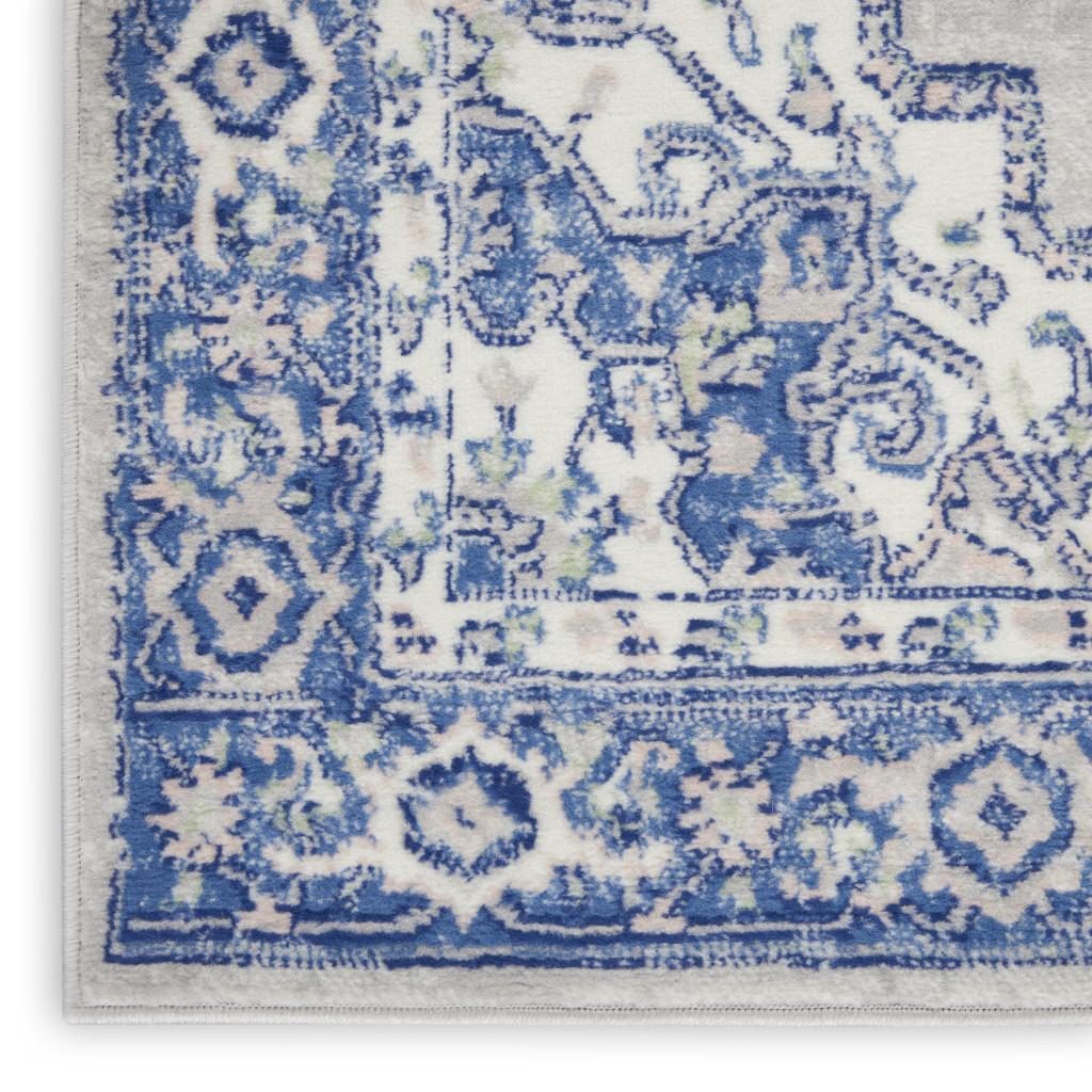 6′ X 9′ Blue and Gray Floral Polypropylene Area Rug