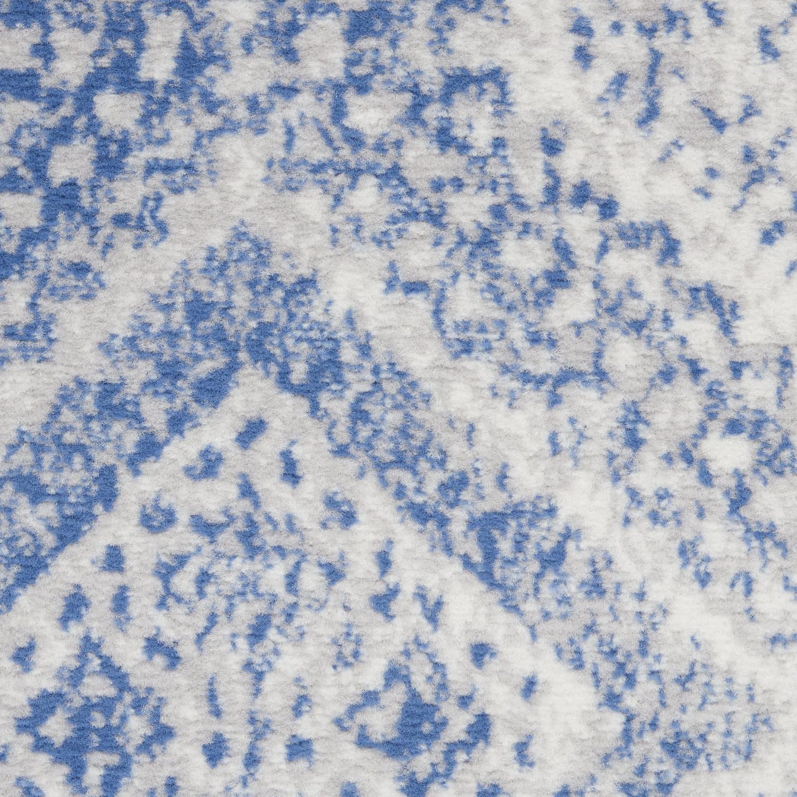 Ivory and Blue Geometric Polypropylene Area Rug
