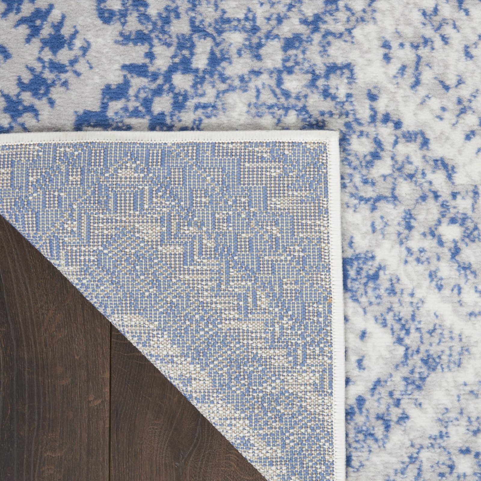 Ivory and Blue Geometric Polypropylene Area Rug