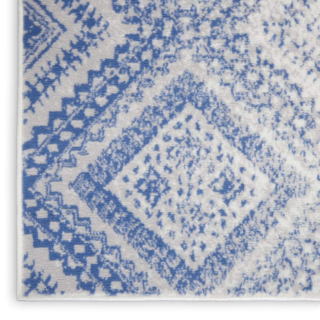 Ivory and Blue Geometric Polypropylene Area Rug