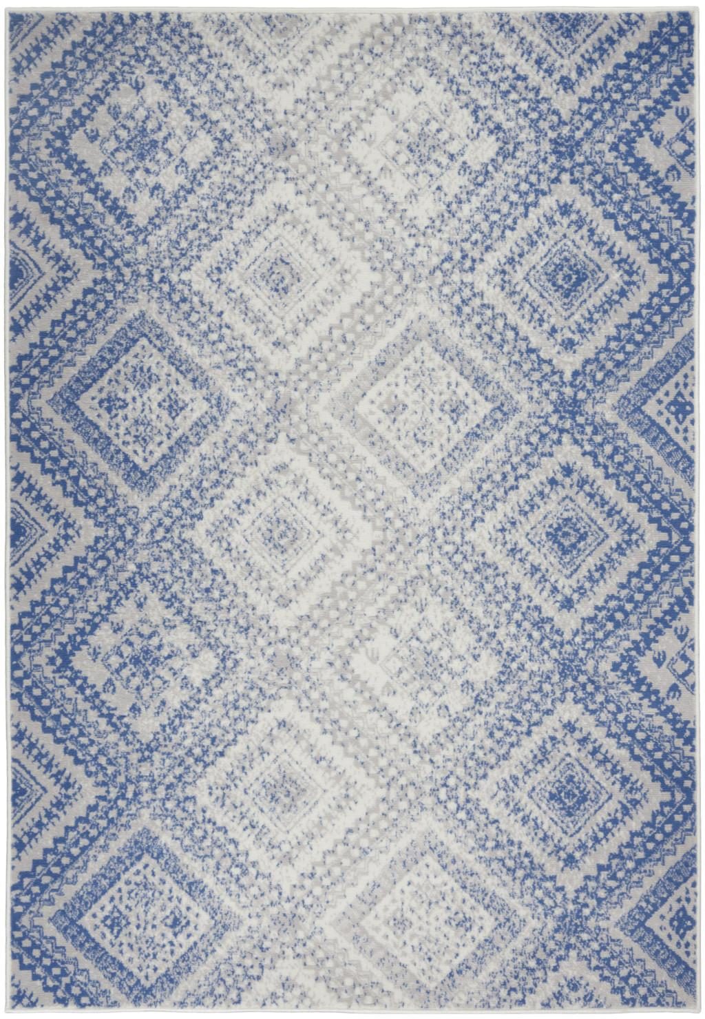 Ivory and Blue Geometric Polypropylene Area Rug