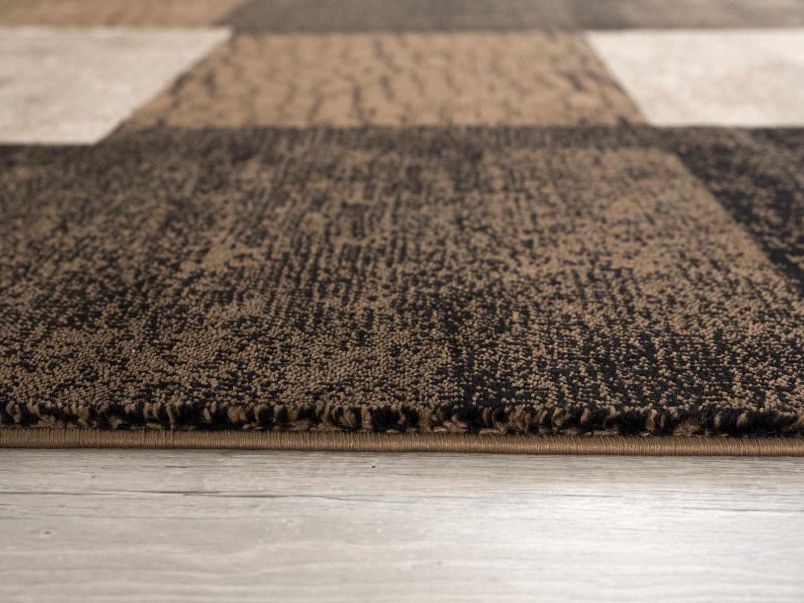 Black and Brown Geometric Distressed Polypropylene Rectangle Area Rug