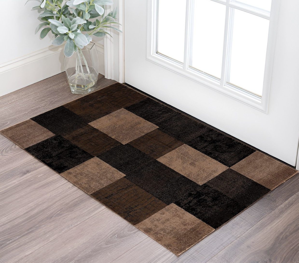 Black and Brown Geometric Distressed Polypropylene Rectangle Area Rug
