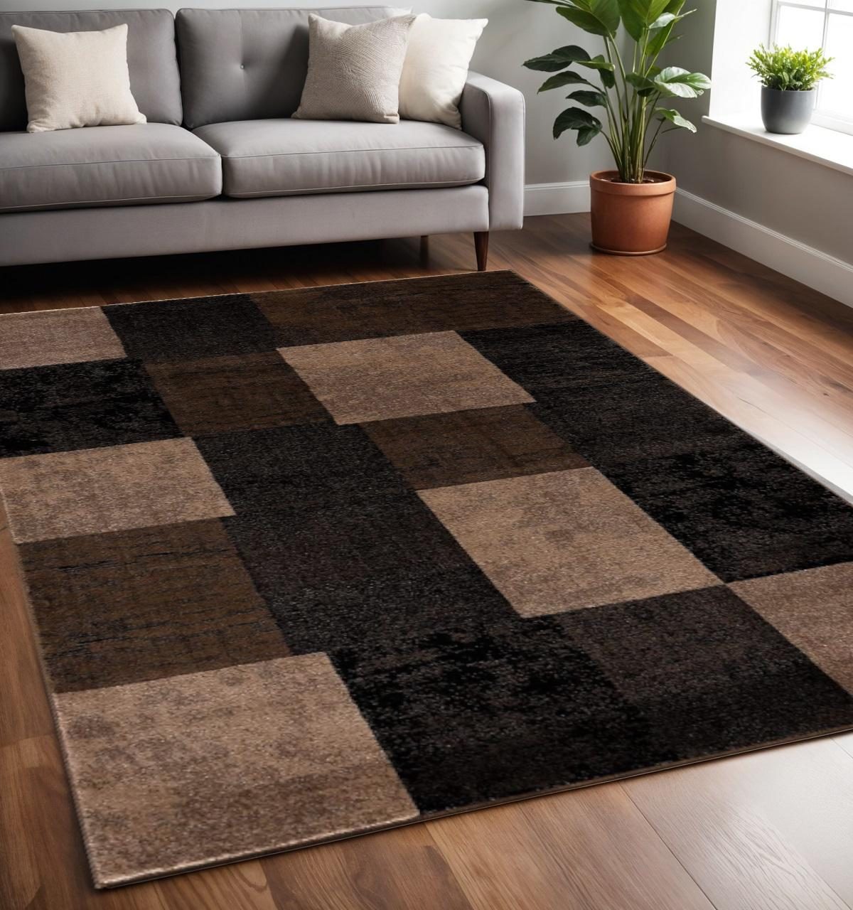 Black and Brown Geometric Distressed Polypropylene Rectangle Area Rug, 5′ × 7′