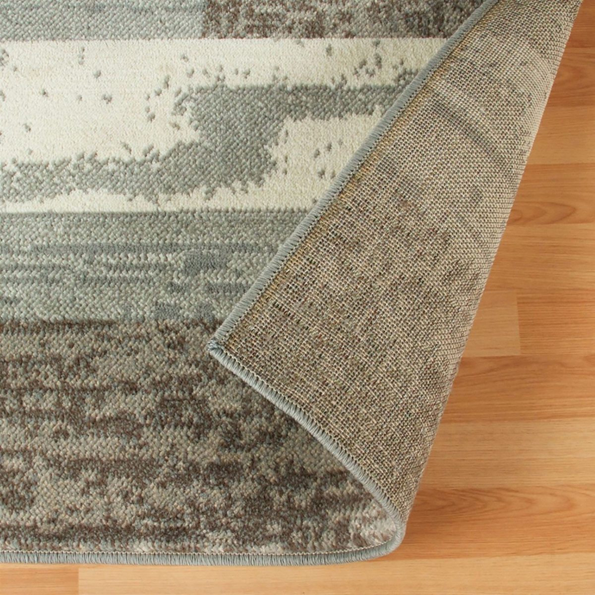 Blue and Ivory Patchwork Polypropylene Rectangle Area Rug