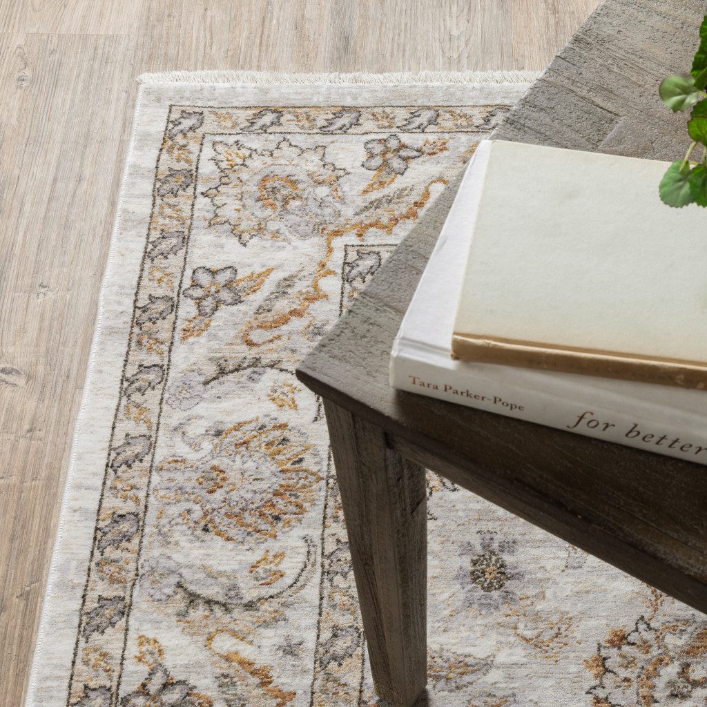 Ivory and Gray Oriental Polyester Area Rug