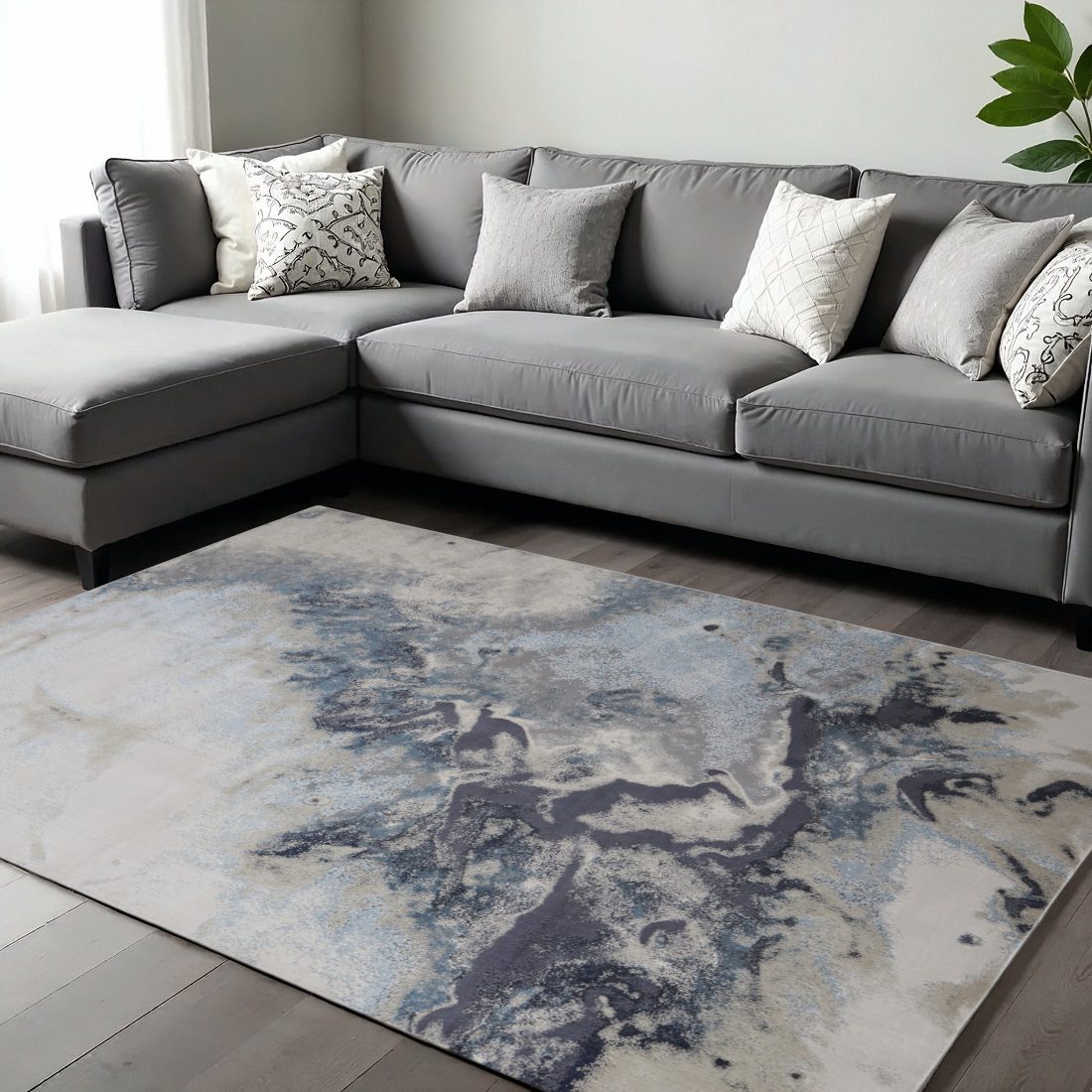 Ivory Black and Gray Abstract Polyester Area Rug, 7′ × 10′