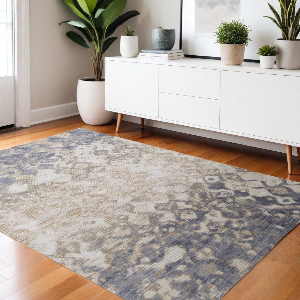 Ivory Tan and Blue Abstract Distressed Polypropylene Area Rug, 4′ × 6′