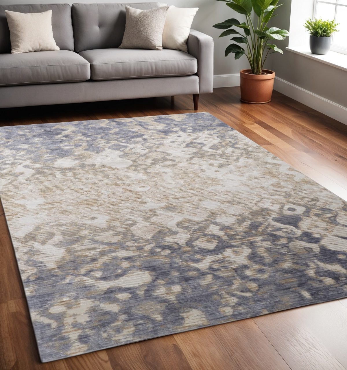 Ivory Tan and Blue Abstract Distressed Polypropylene Area Rug, 5′ × 8′