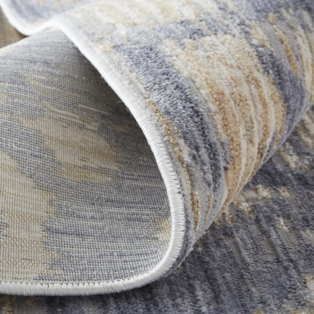 Ivory Tan and Blue Abstract Distressed Polypropylene Area Rug