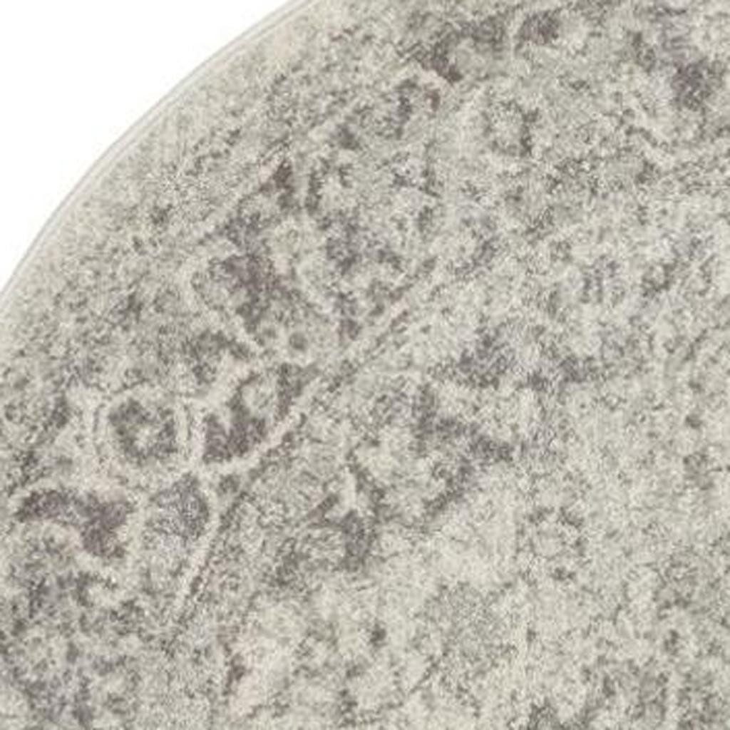 Green and Ivory Floral Distressed Polypropylene Area Rug