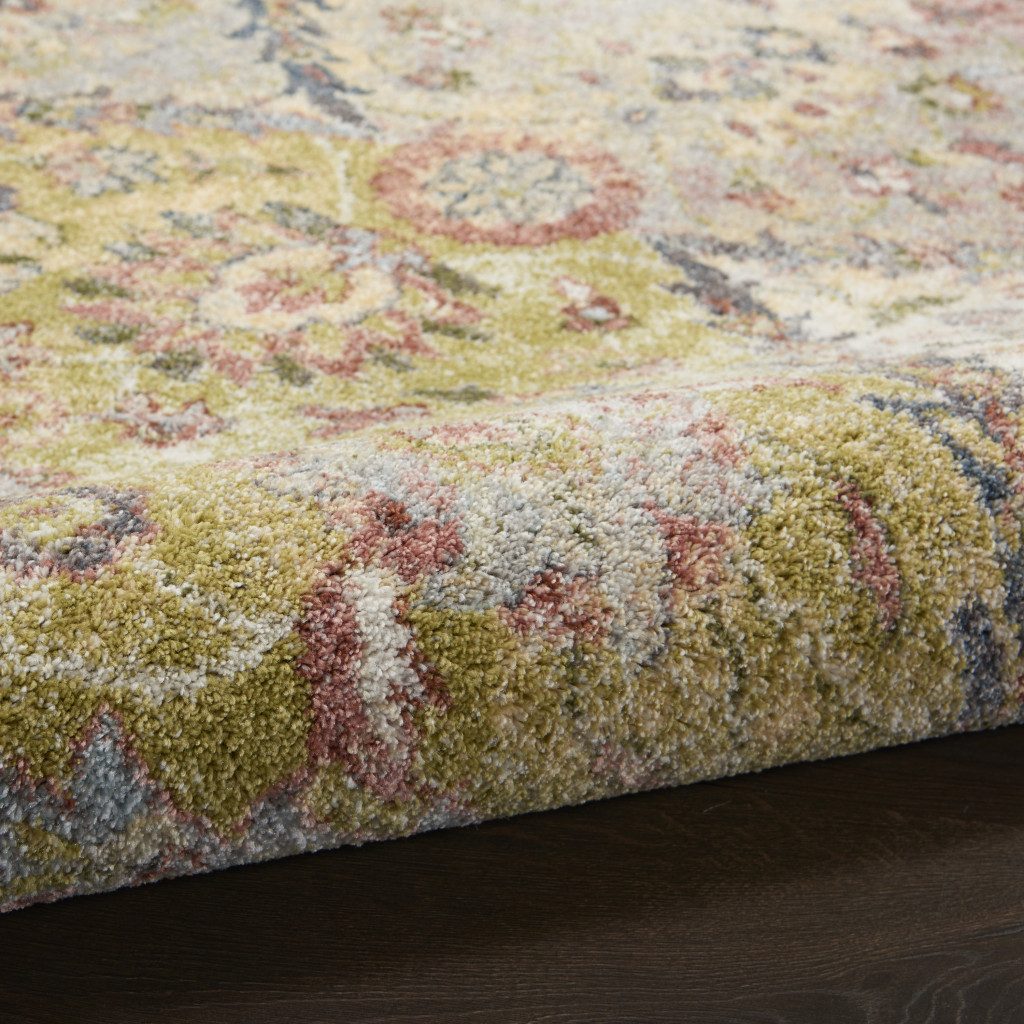 Green and Ivory Floral Distressed Polypropylene Area Rug, 5′ × 7′