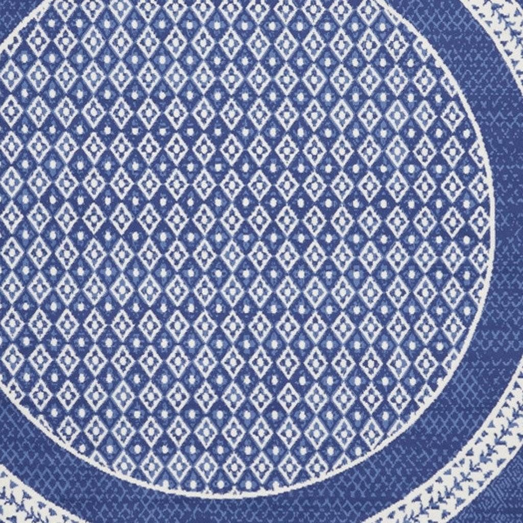 Ivory and Navy Blue Geometric Distressed Polypropylene Area Rug