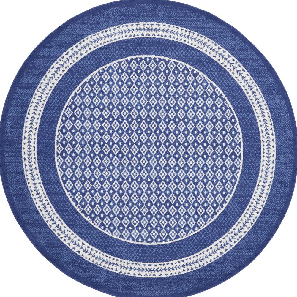 Ivory and Navy Blue Geometric Distressed Polypropylene Area Rug