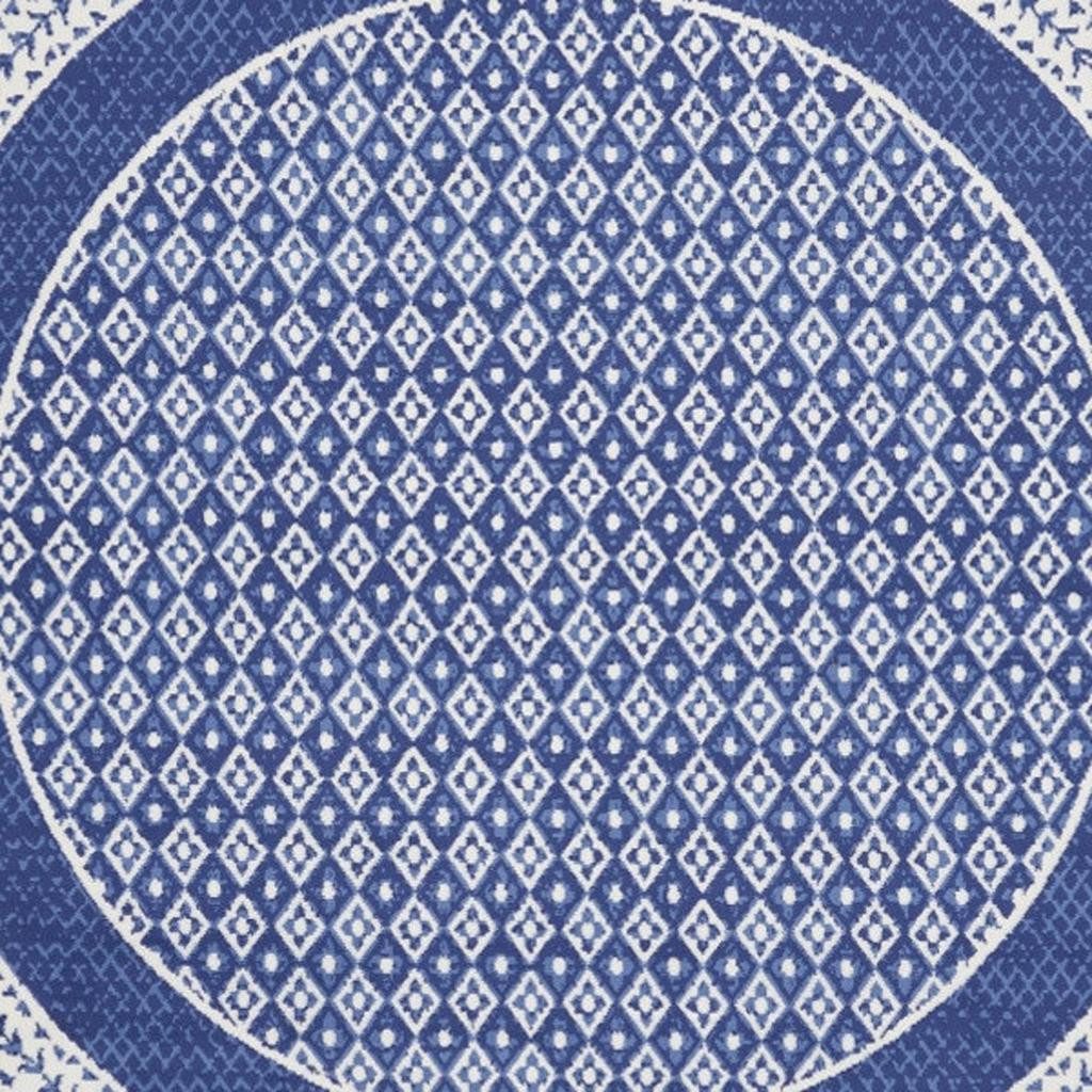 Ivory and Navy Blue Geometric Distressed Polypropylene Area Rug