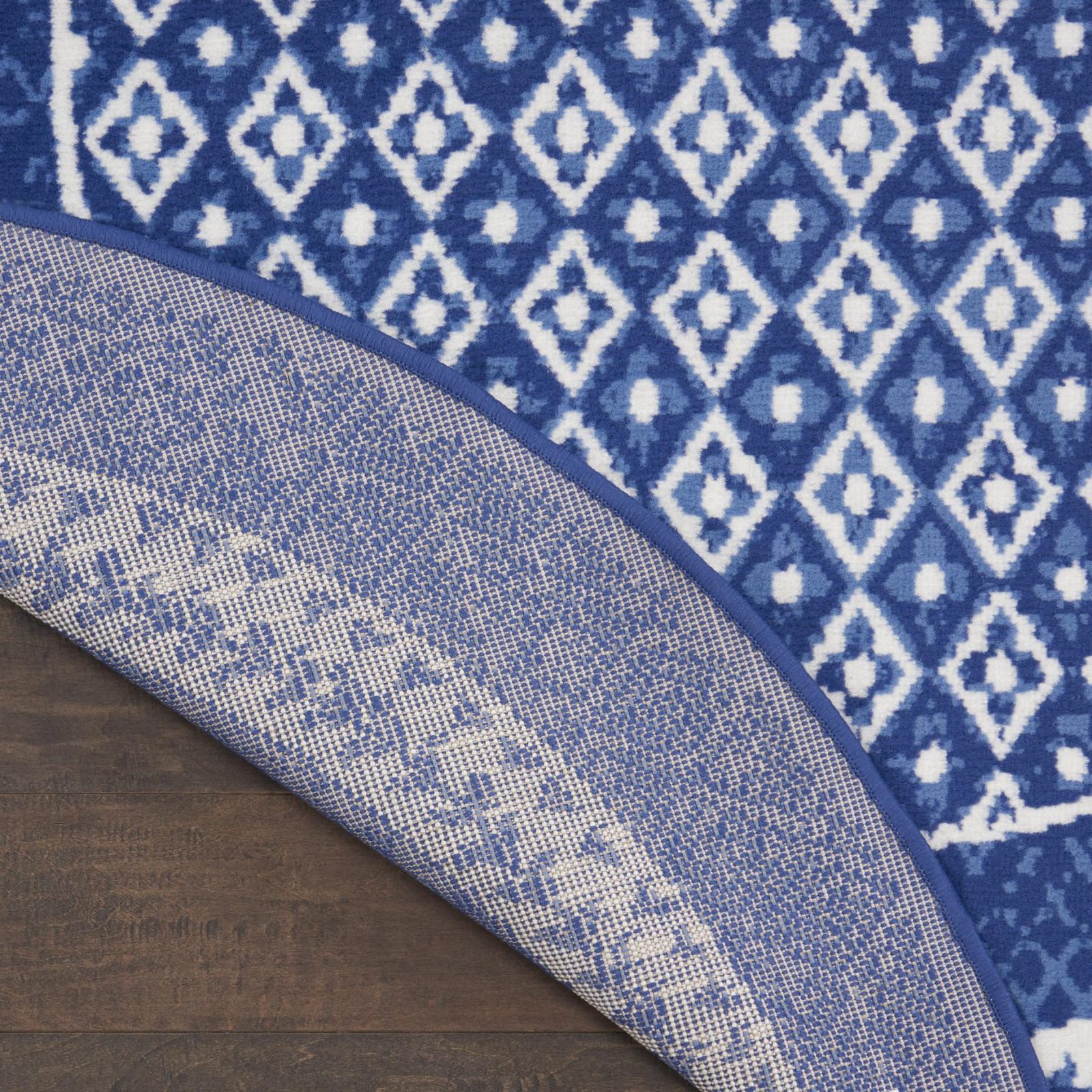 Ivory and Navy Blue Geometric Distressed Polypropylene Area Rug