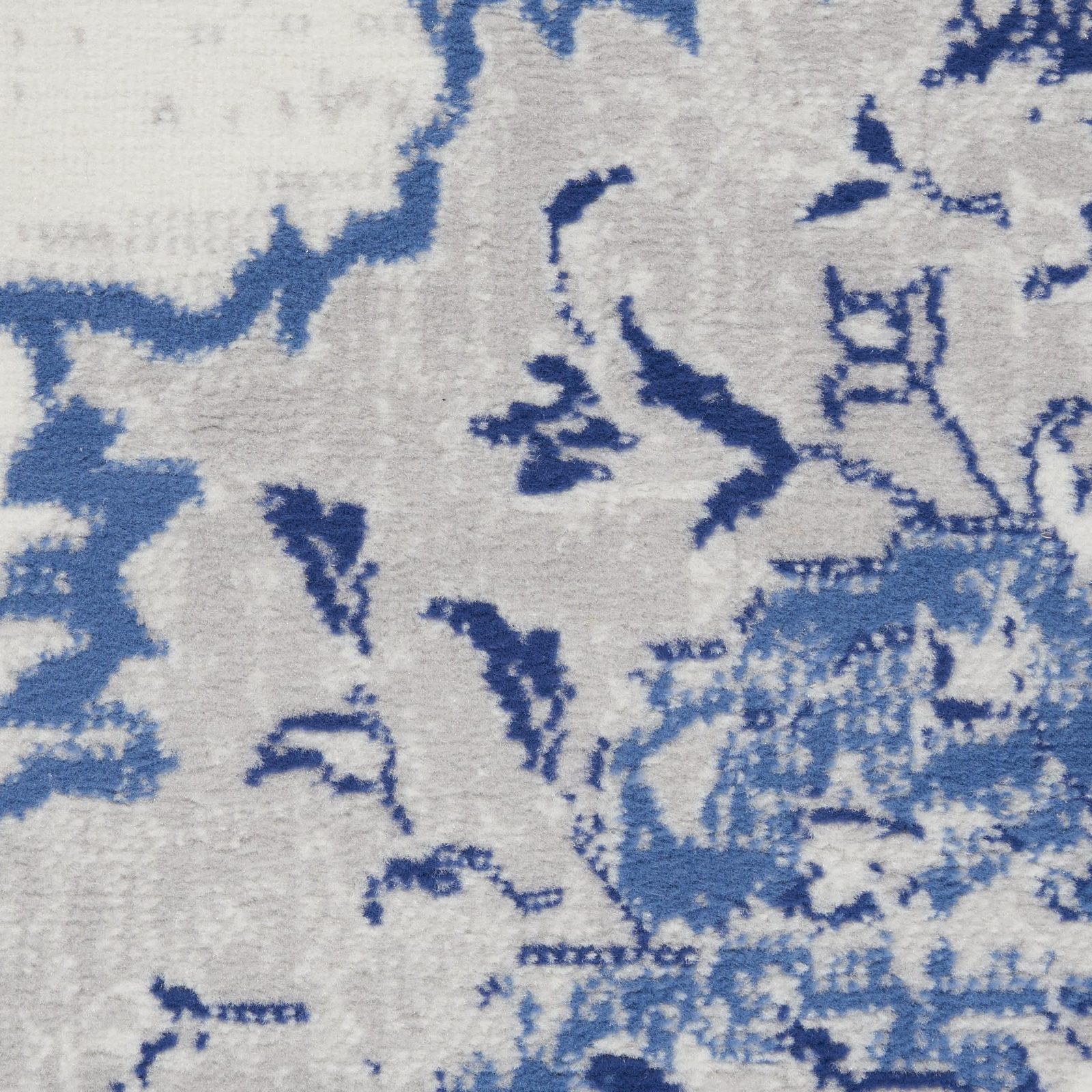 Ivory and Navy Blue Abstract Distressed Polypropylene Rectangle Area Rug