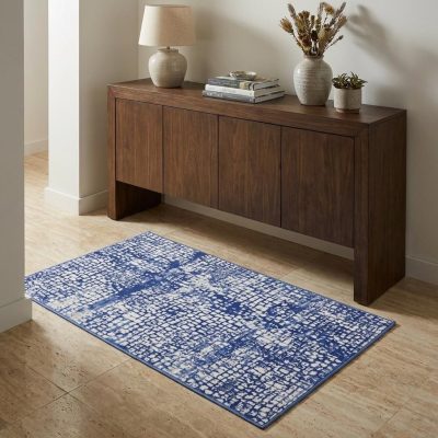 Ivory and Navy Blue Abstract Distressed Polypropylene Rectangle Area Rug