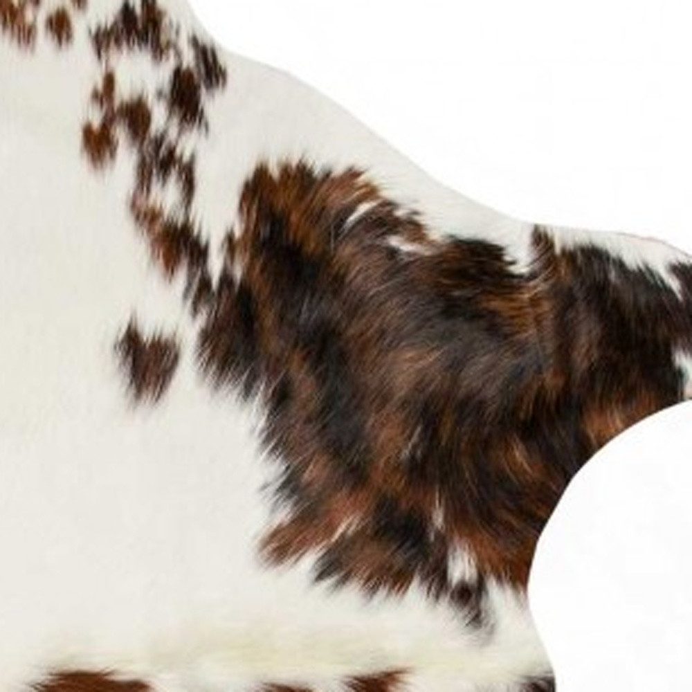5′ X 7′ Brown And White Cowhide Area Rug