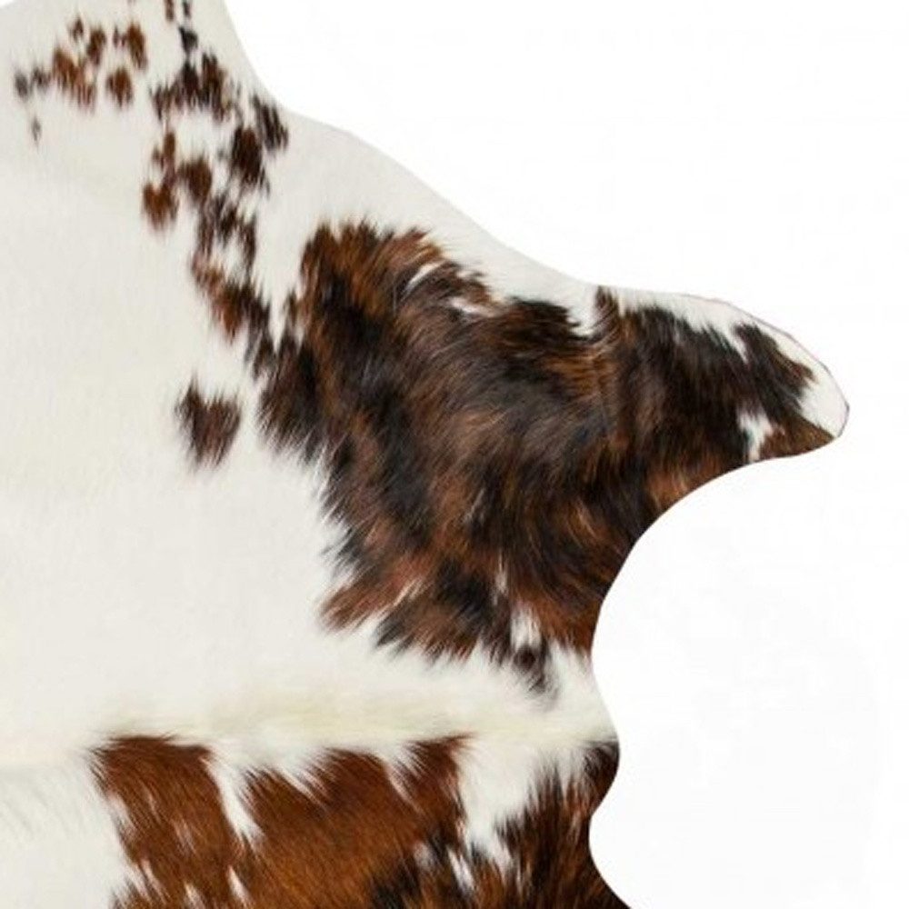 5′ X 7′ Brown And White Cowhide Area Rug
