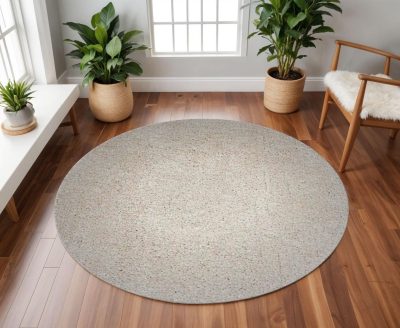8′ Ivory Hand Woven Round Rug