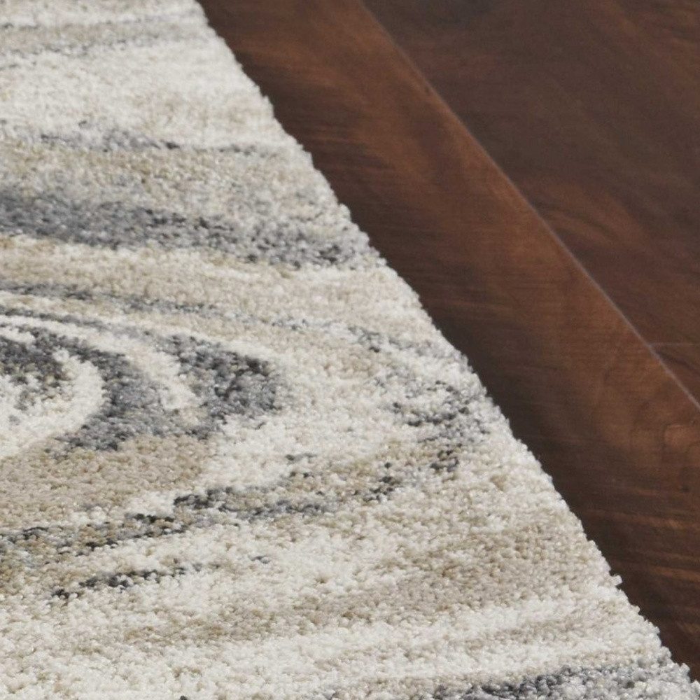 7′ X 9′ Gray And Tan Abstract Area Rug