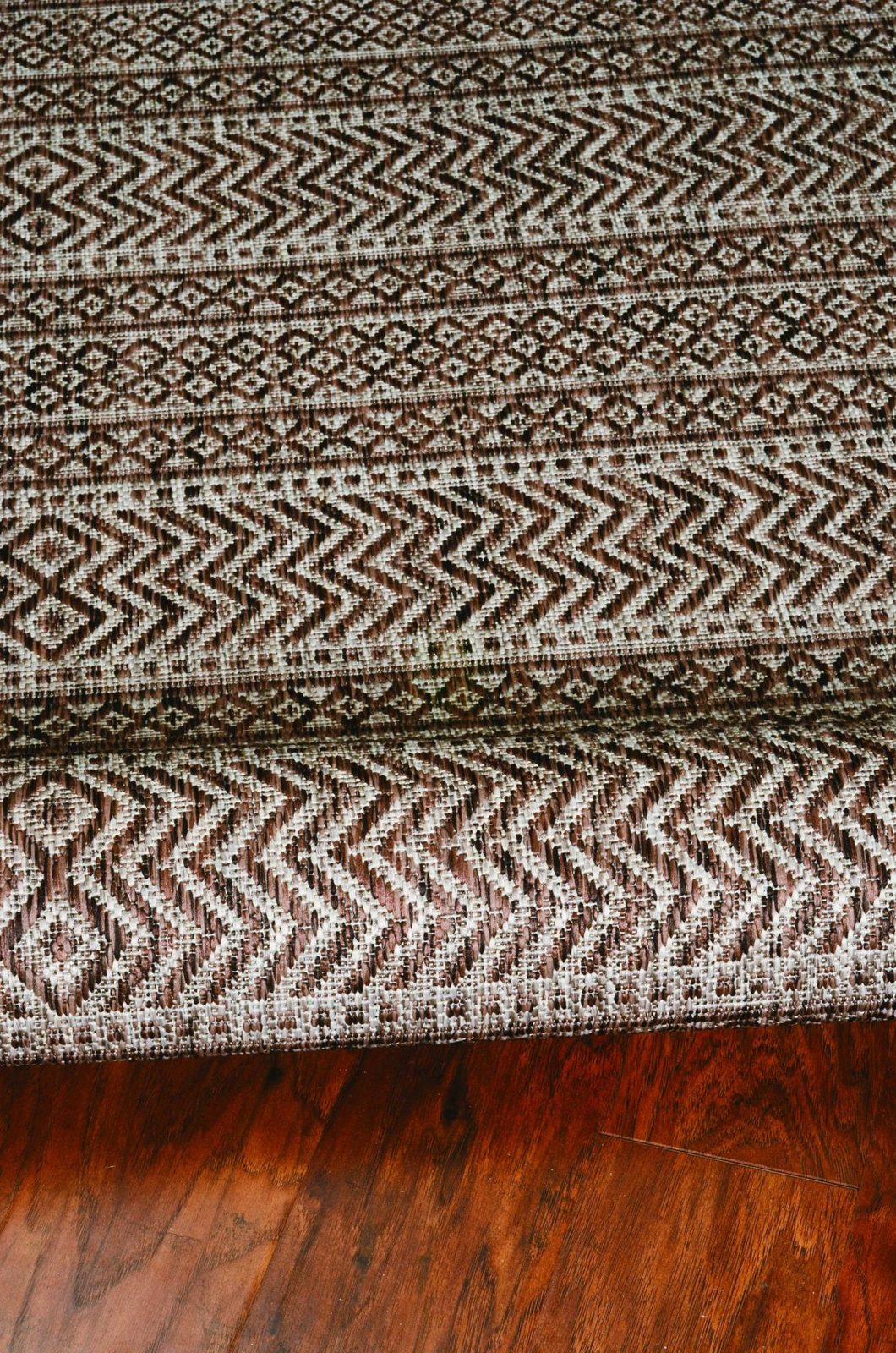8′ X 11′ Brown And Ivory Geometric Area Rug