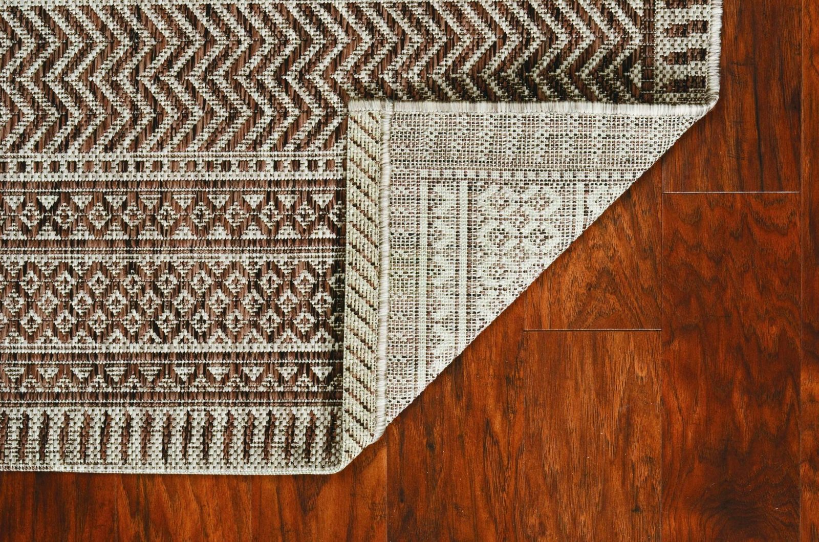 8′ X 11′ Brown And Ivory Geometric Area Rug