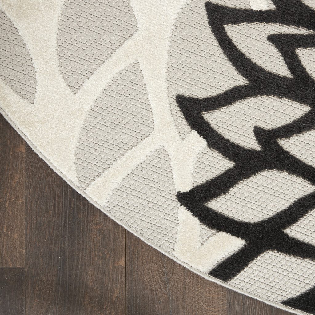 4′ Black And White Round Indoor Outdoor Rug