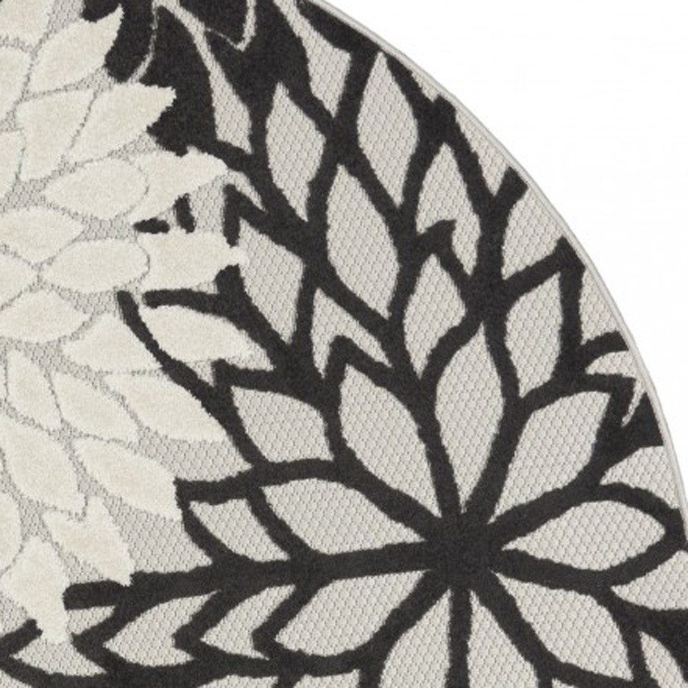 4′ Black And White Round Indoor Outdoor Rug