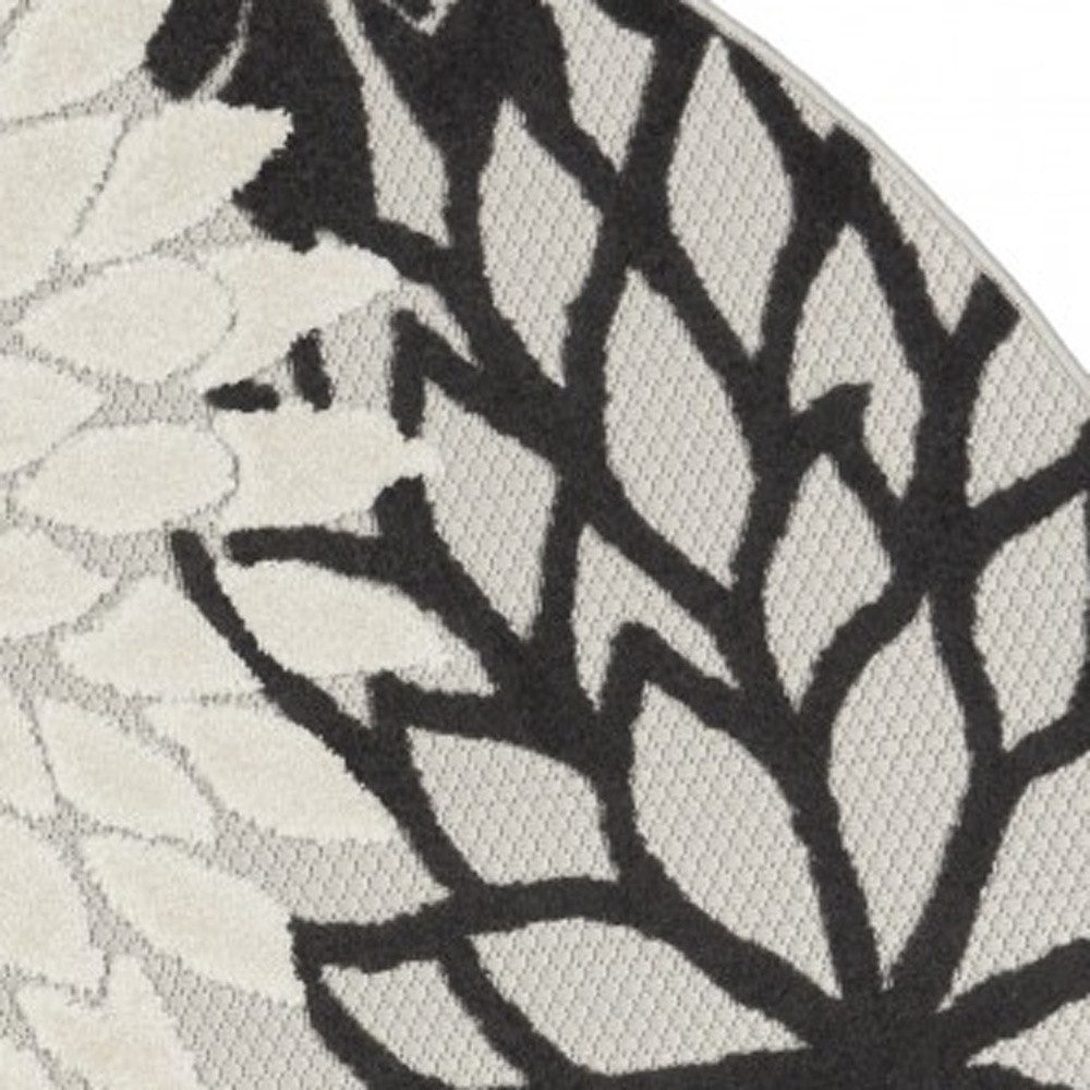 4′ Black And White Round Indoor Outdoor Rug