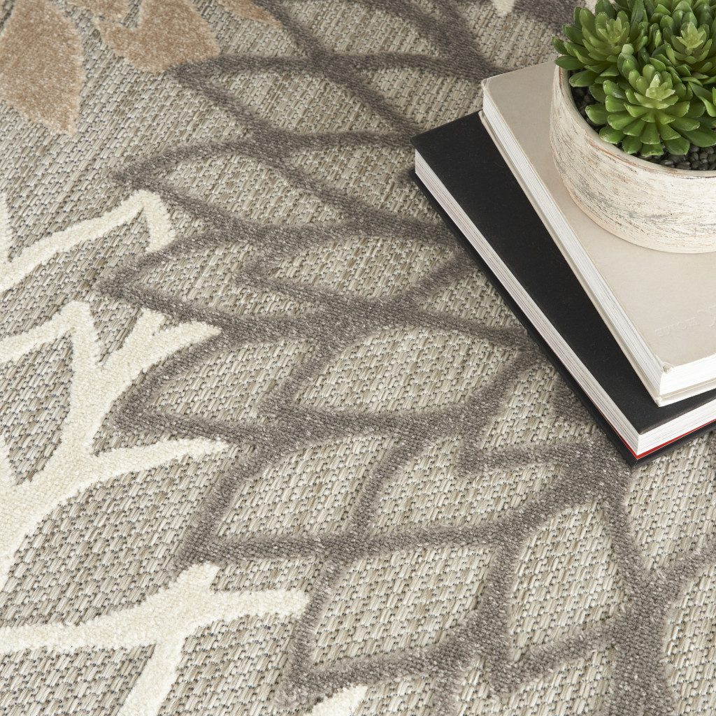 8′ Gray and Ivory Round Indoor Outdoor Area Rug