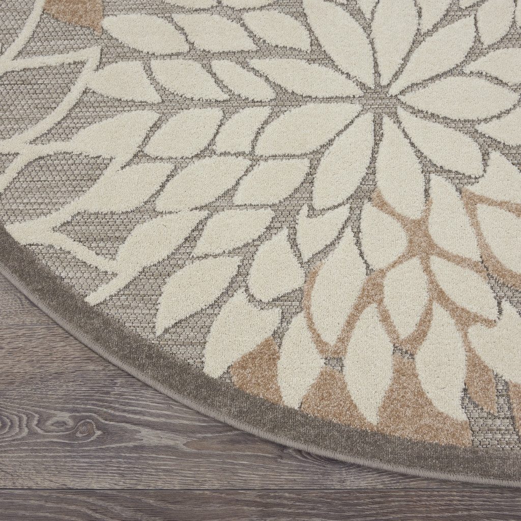 8′ Gray and Ivory Round Indoor Outdoor Area Rug
