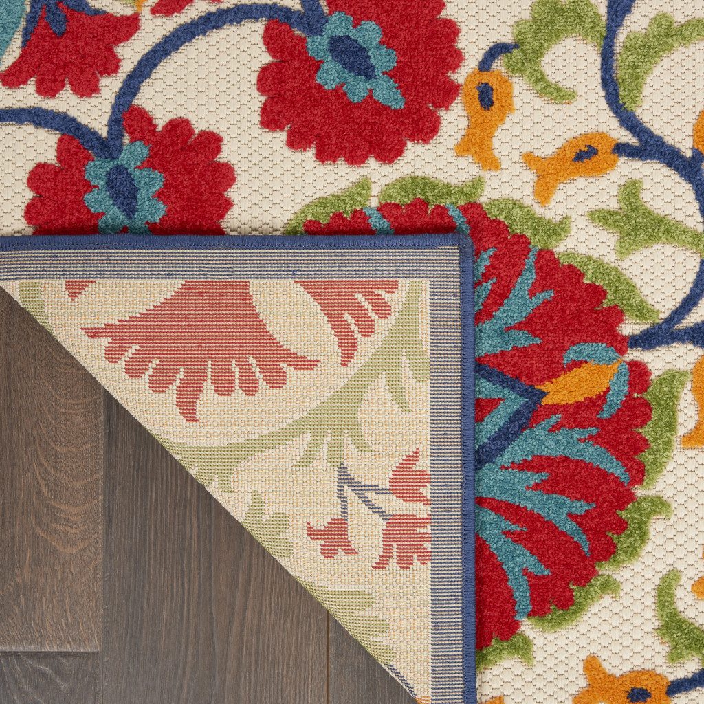 10′ Red and Ivory Floral Indoor Outdoor Area Rug