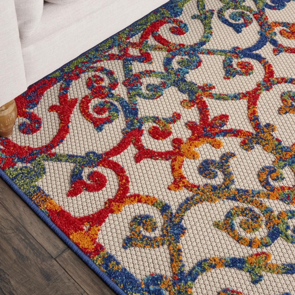 6′ X 9′ Ivory And Blue Indoor Outdoor Area Rug