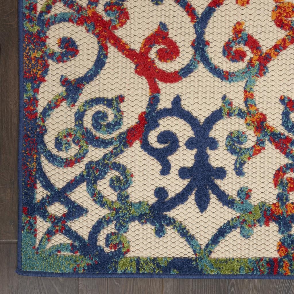 6′ X 9′ Ivory And Blue Indoor Outdoor Area Rug