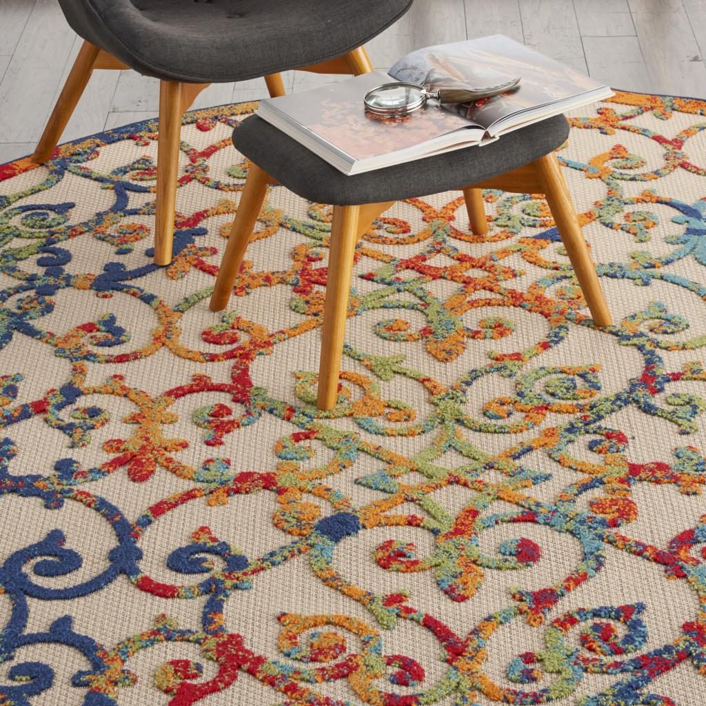 8′ Ivory and Blue Round Indoor Outdoor Area Rug