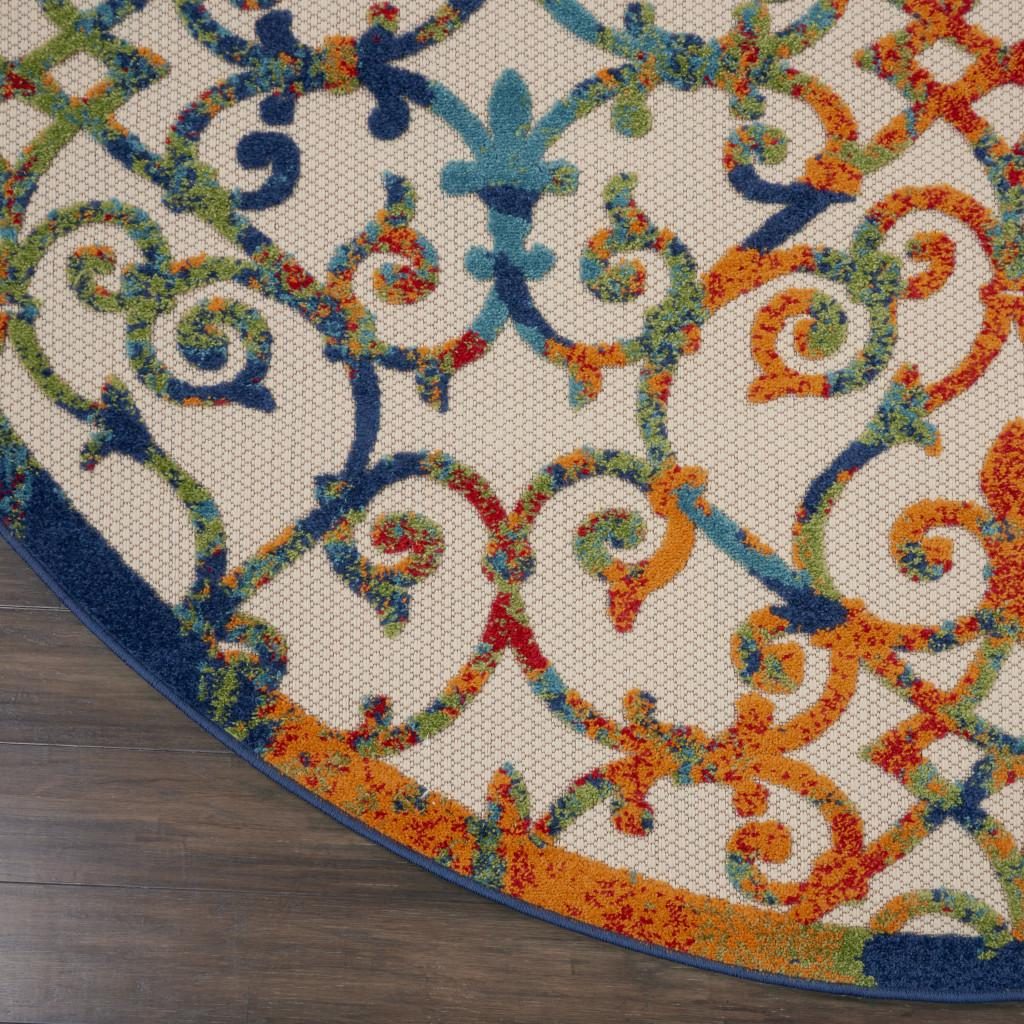 8′ Ivory and Blue Round Indoor Outdoor Area Rug