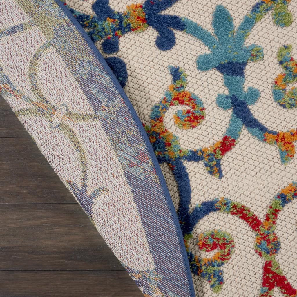 8′ Ivory and Blue Round Indoor Outdoor Area Rug